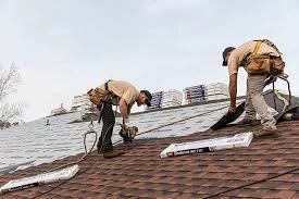men installing a new roof